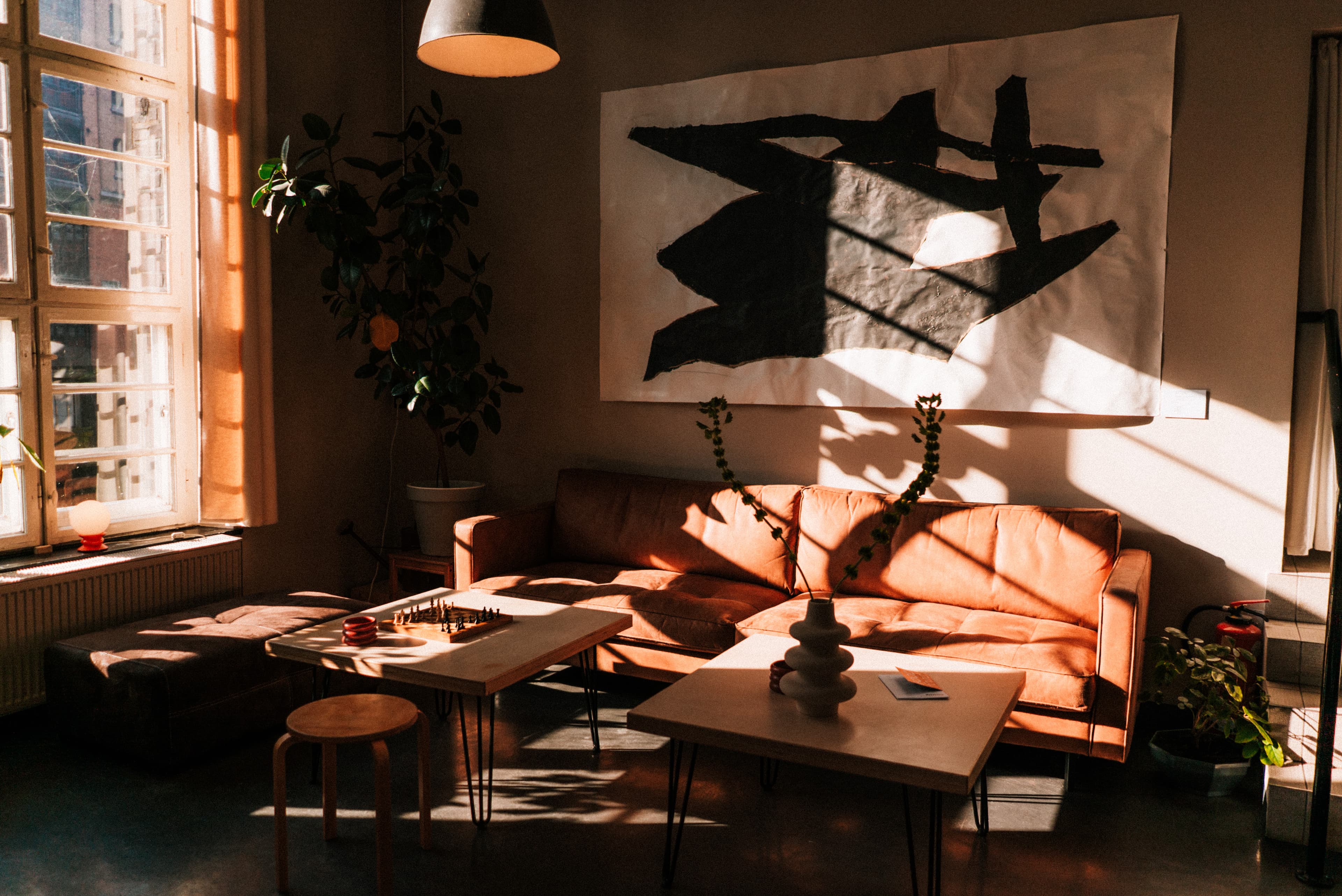 Living room with gray three-seater sofa
