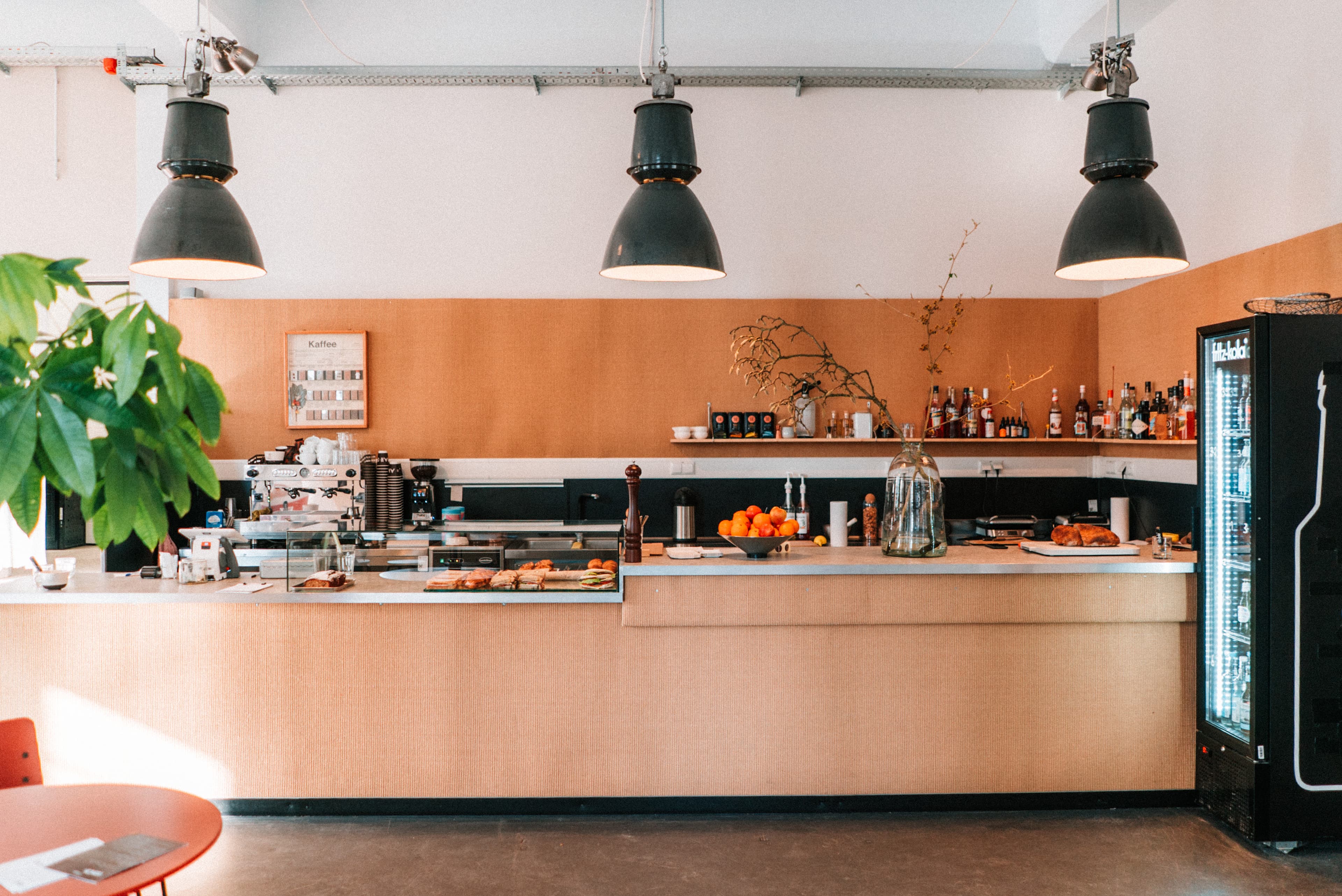 Living room with gray three-seater puffy sofa